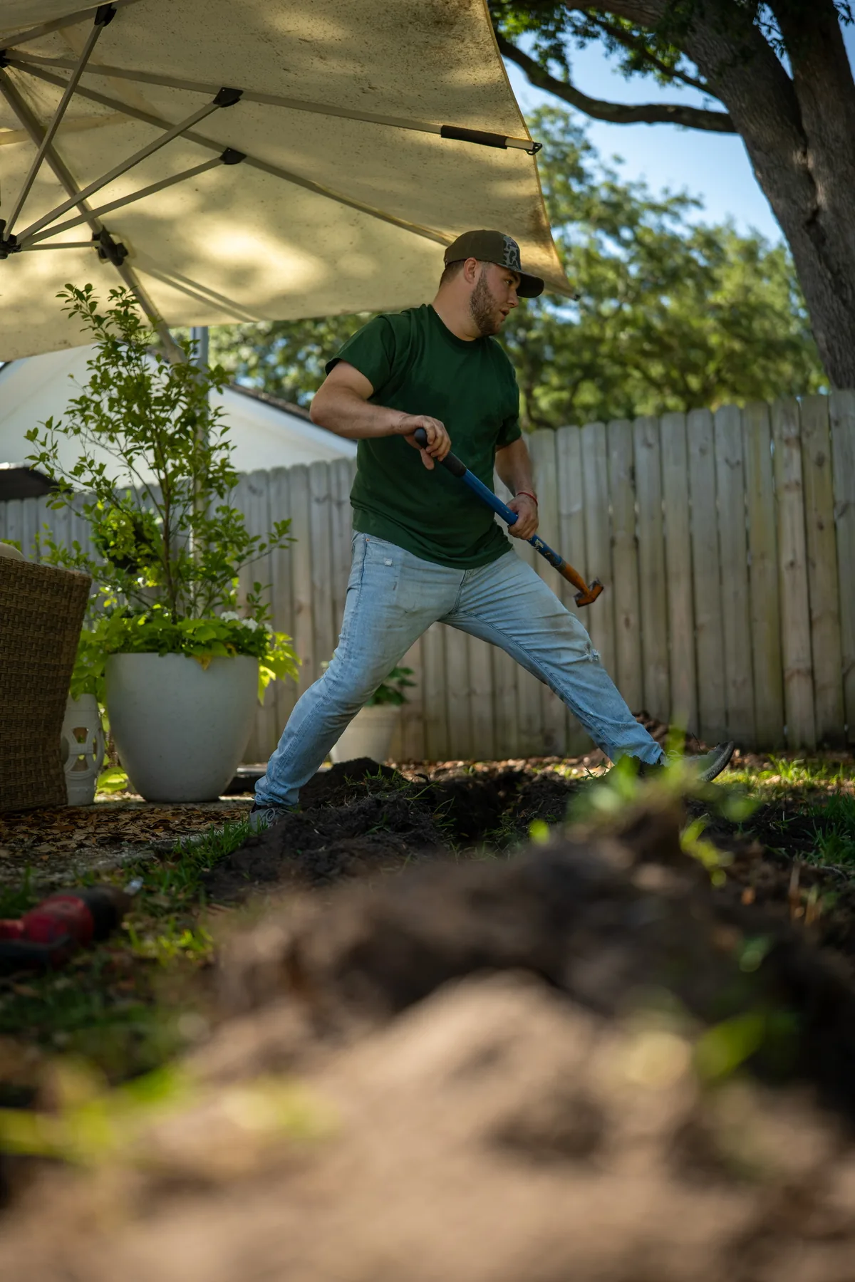 Irrigation work around a landscape bed